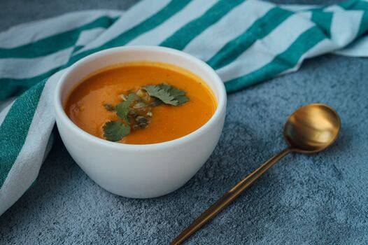 a photo of a bowl of soup showing the three-fourths camera angle